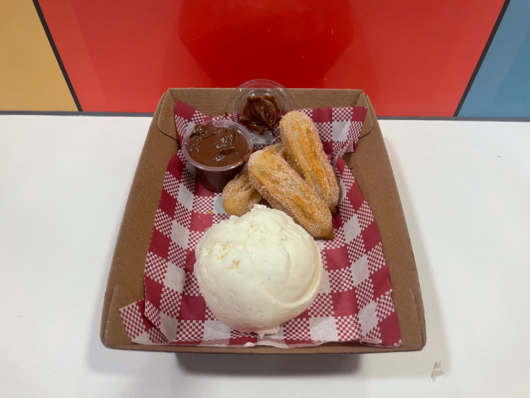 Churros with gelato and chocolate sauce